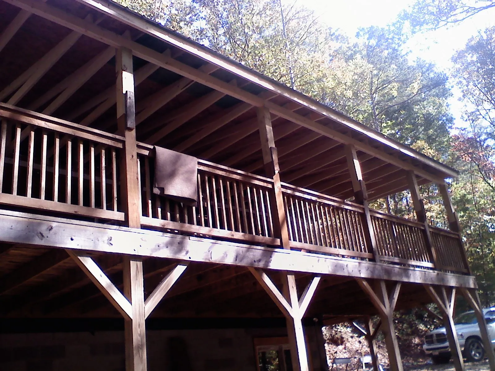 Timber framing under a new elevated porch and deck — Roof Leak Repair in Winter Park by Roofing Brothers